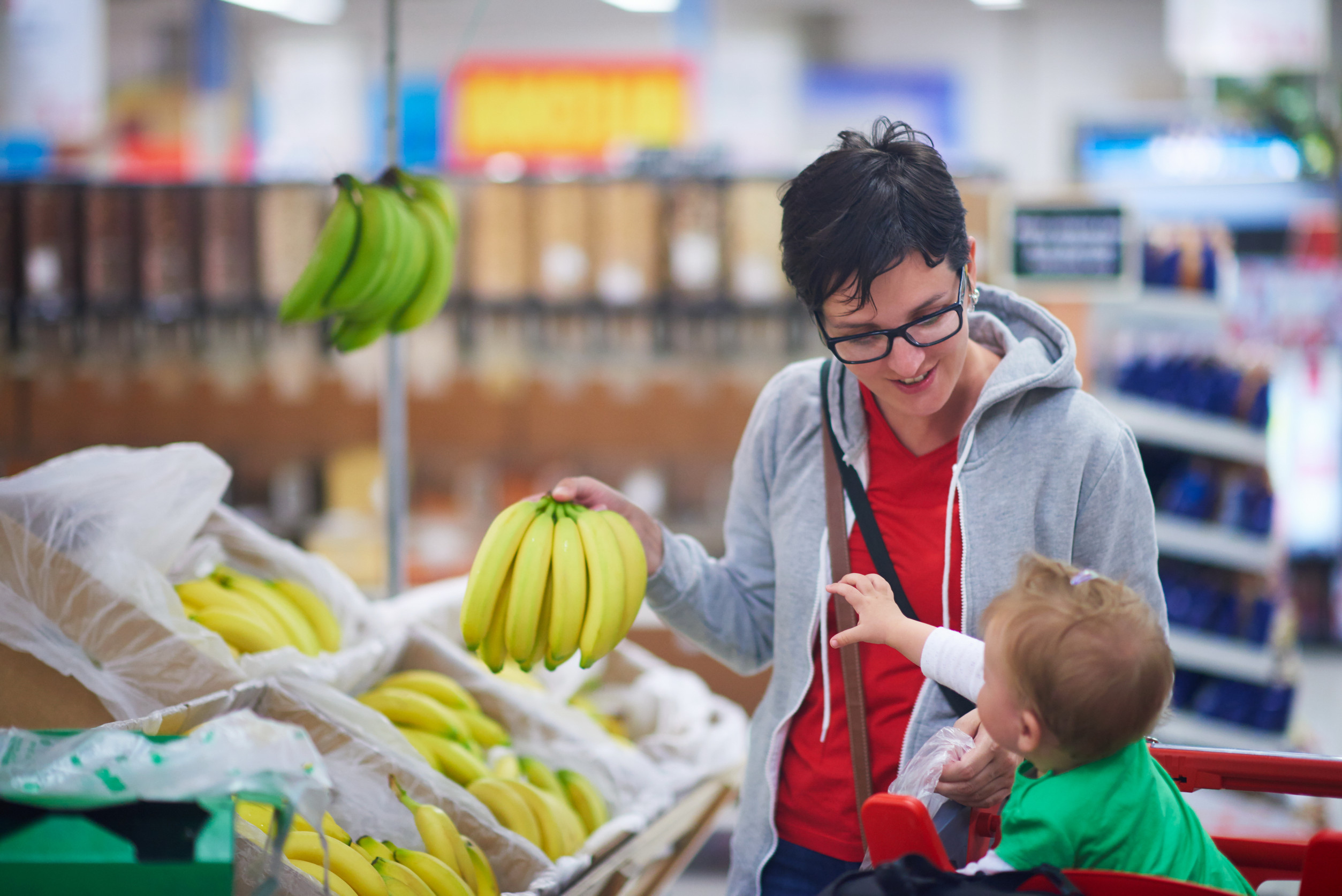 mother with baby in shopping