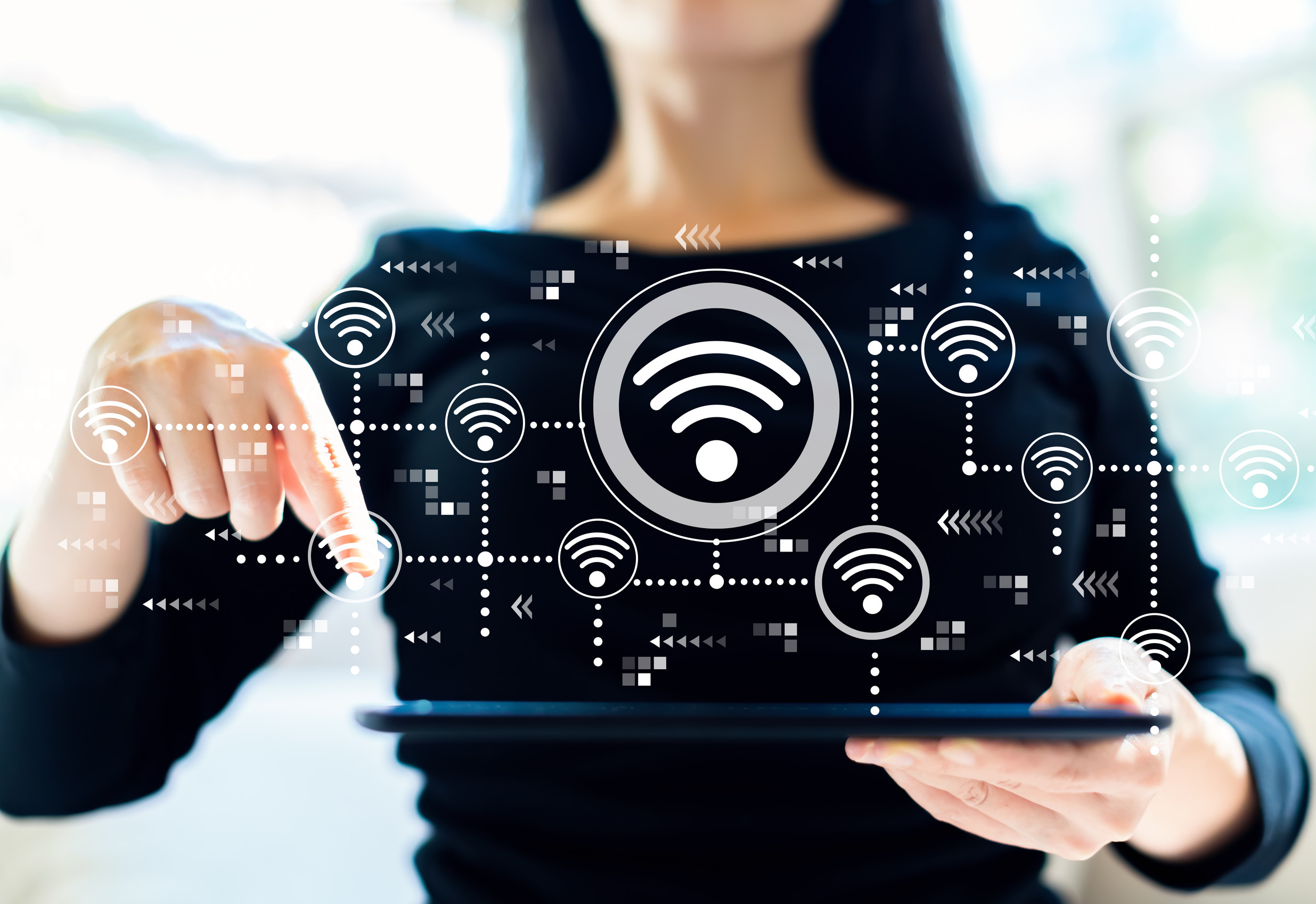 Wifi concept with woman using tablet