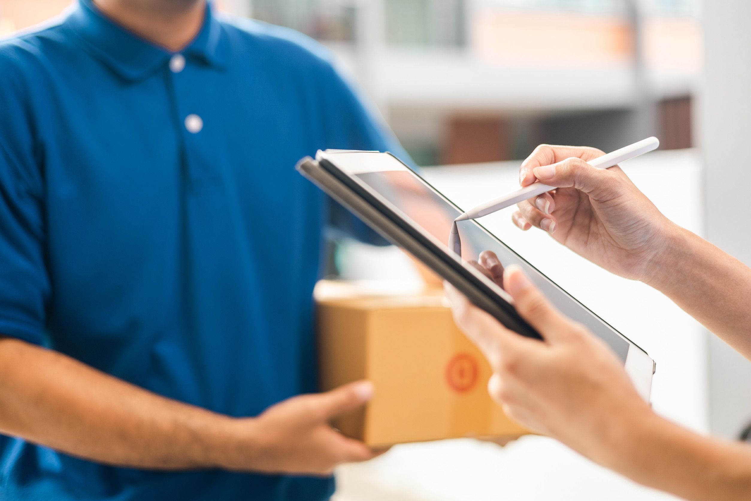Hand woman signing electronic Signature on tablet for agreement